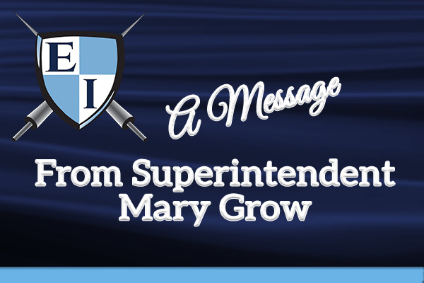 EICSD Logo on blue background text reading E I and a message from the superintendent Mary Grow