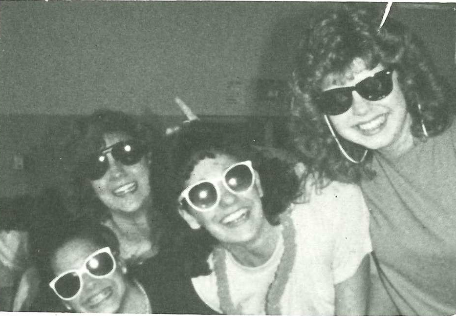 Yearbook photo from 1987, students wearing sunglasses.