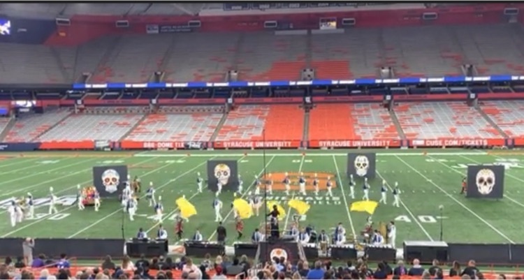 marching band performing their show at the dome  