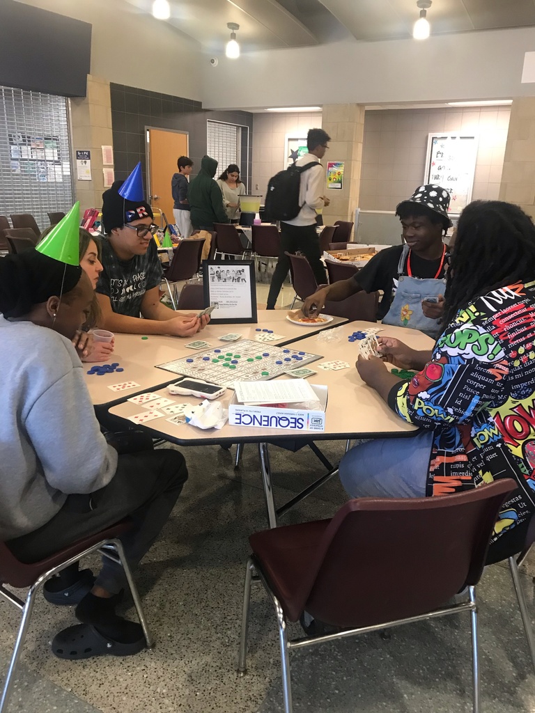 Students gathered to play games during the birthday fundraiser wearing thei r party hats