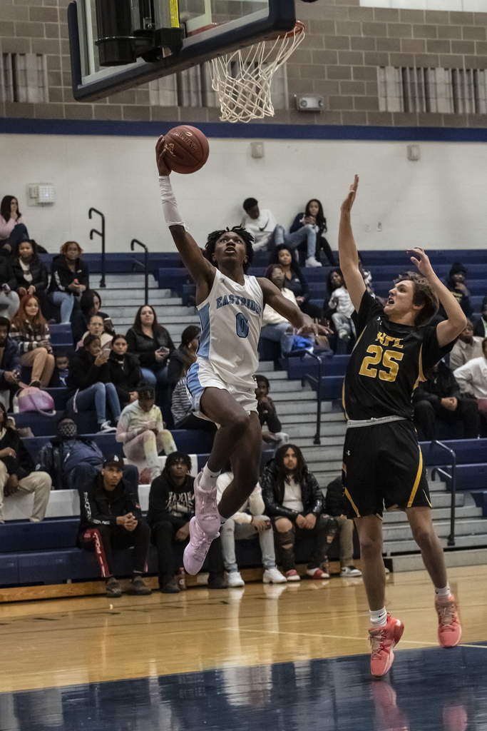 #0 going up for a layup on the EI boys varsity