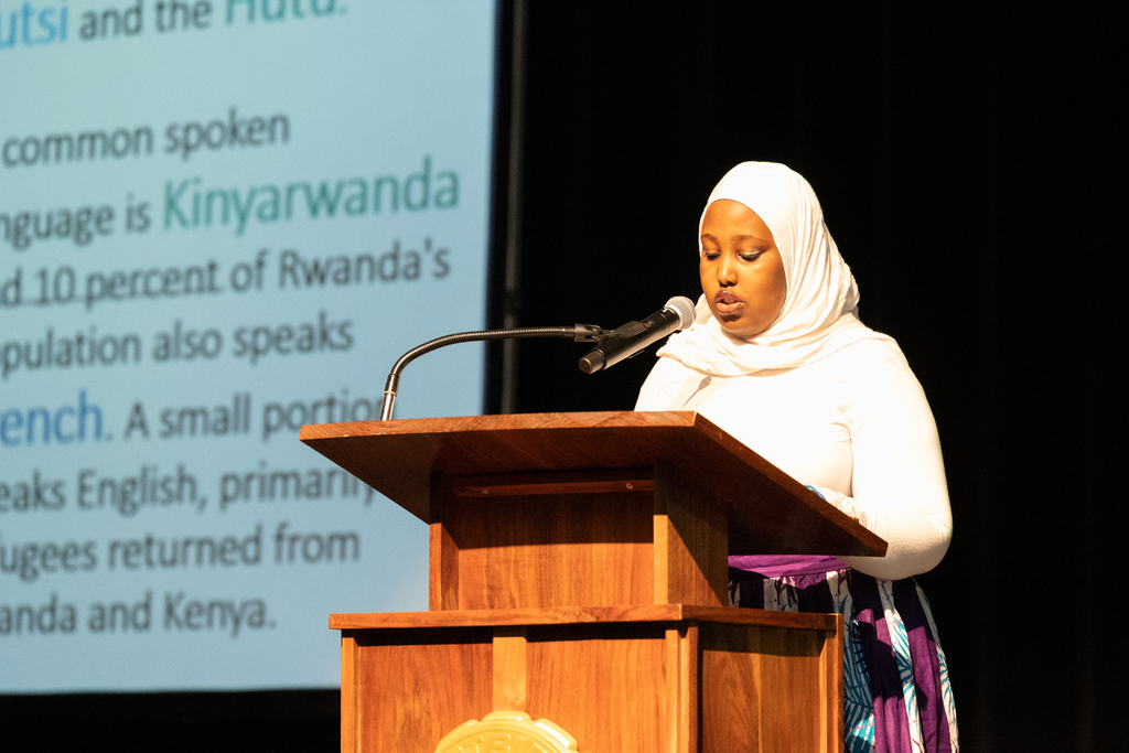 Student presenting on Rwanda.