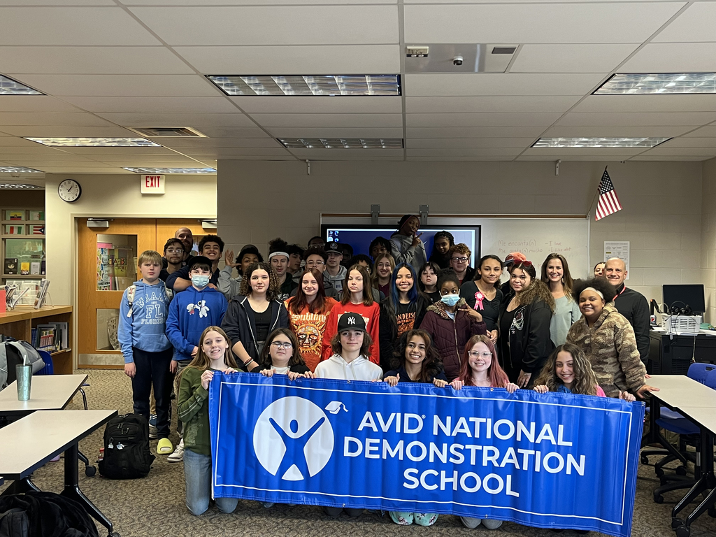 AVID Students and Staff With Banner