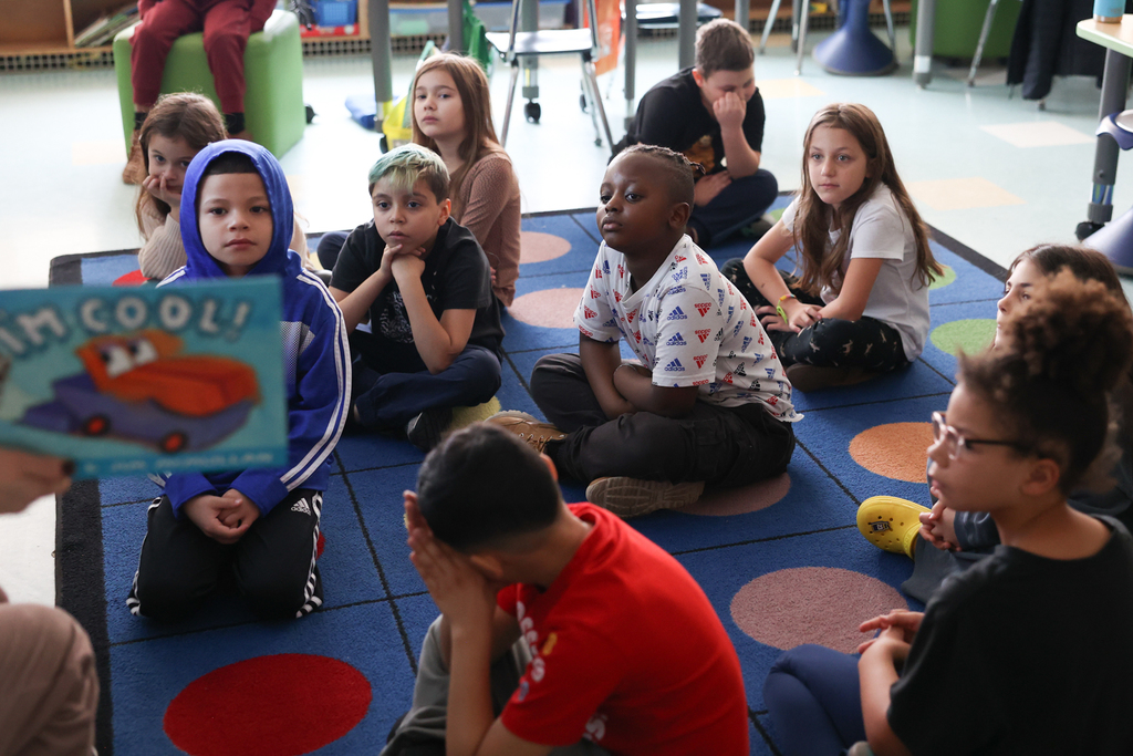 students listening to guest reader