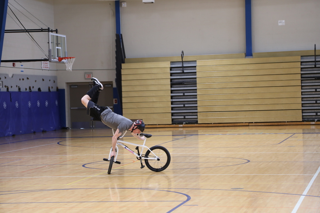 speaker doing bike stunts