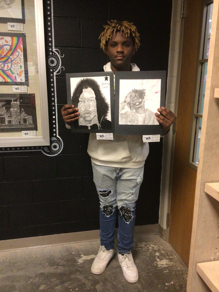 student with artwork