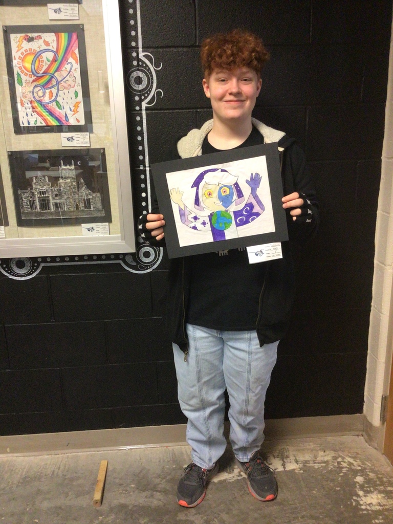 student with artwork