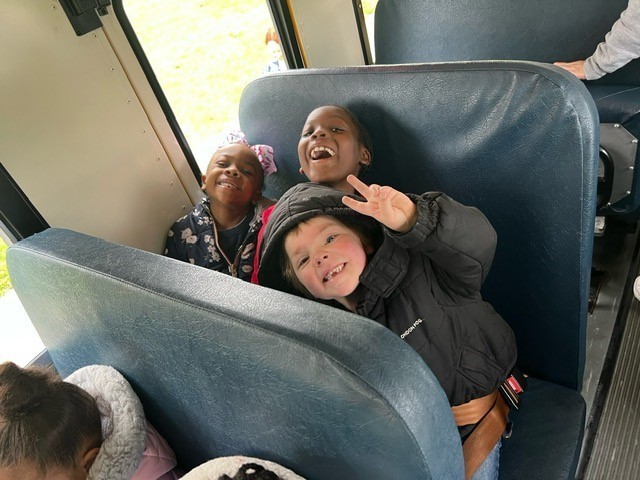 Kindergarten students on the bus going to their fieldtrip to RMSC